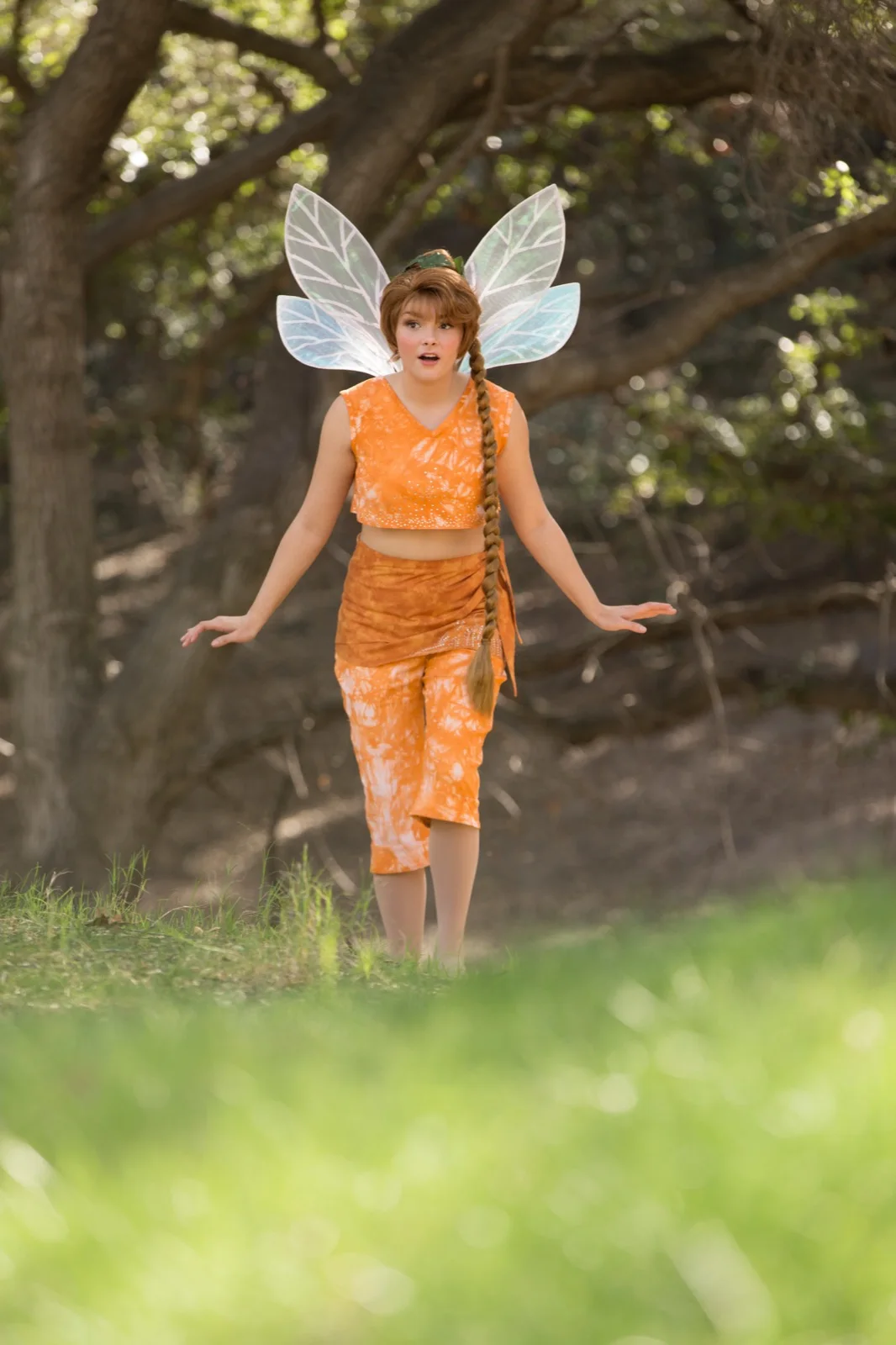 Orange Fairy party character in Houston